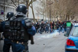 PARIS, FRANCE - FEBRUARY 22: Clashes between police and rioters take place as High school students gather for a demonstration to support Theo and against Police violence at Place de la Nation on February 23, 2017 in Paris, France. Theo, 22, was arrested by four policemen in the Rose des Vents district of Aulnay sous Bois in Seine Saint Denis on Thursday, February 2nd. He was later admitted to hospital, suffering serious injuries after allegedly been sodomized by police officers with a truncheon. The scene was filmed and widely distributed, before one of the policemen was charged with rape, the other three for voluntary violence, all officers have been suspended. (Photo by Aurelien Morissard/IP3/Getty Images)